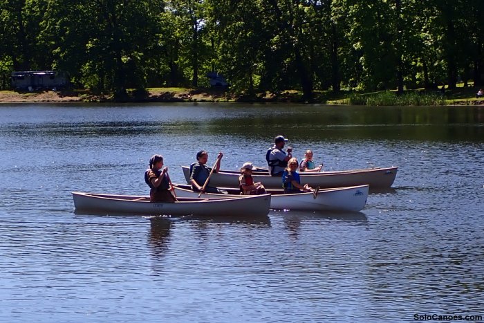 Family canoe paddling